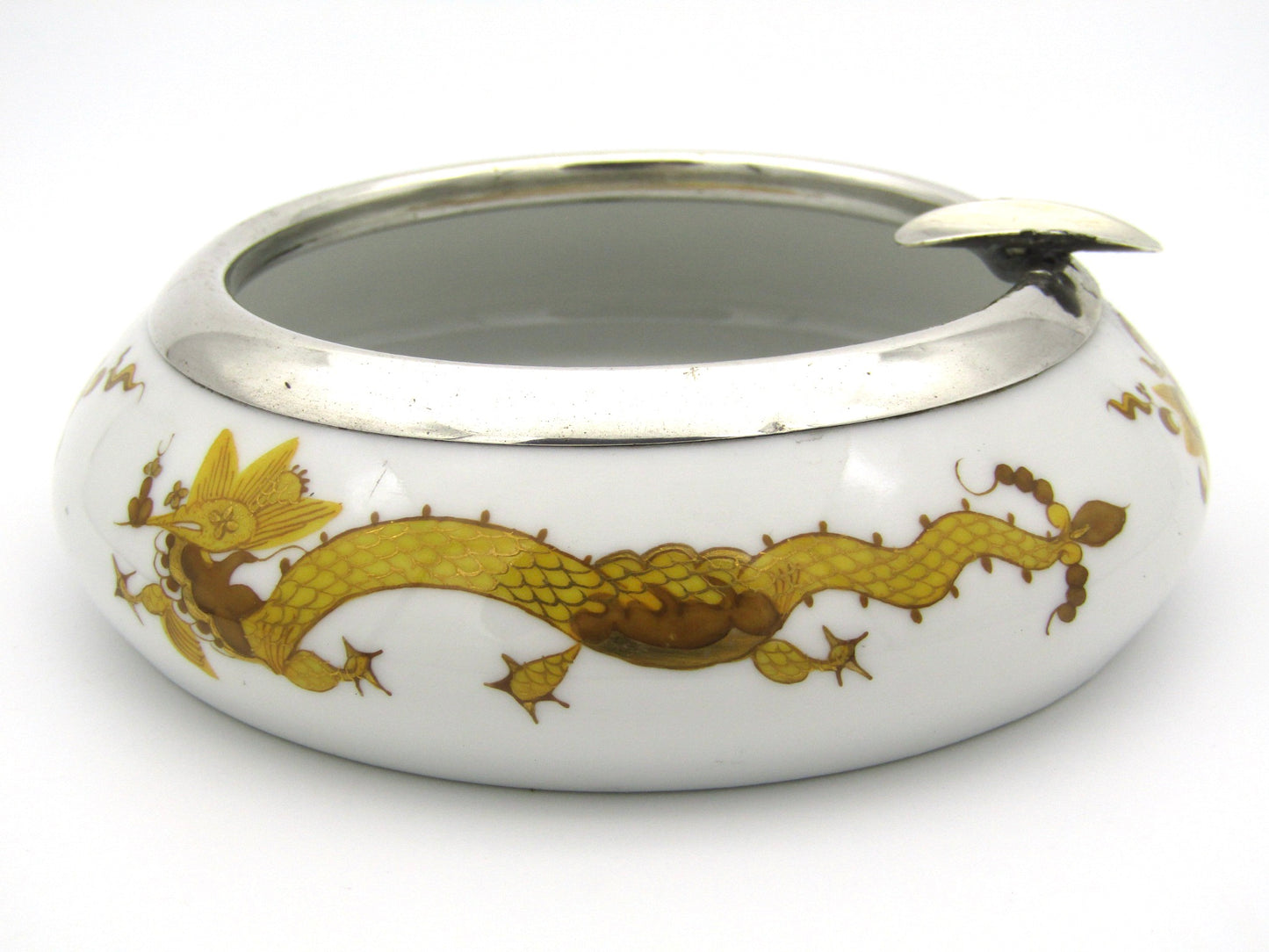 Meissen golden dragon ashtray with silver mount.