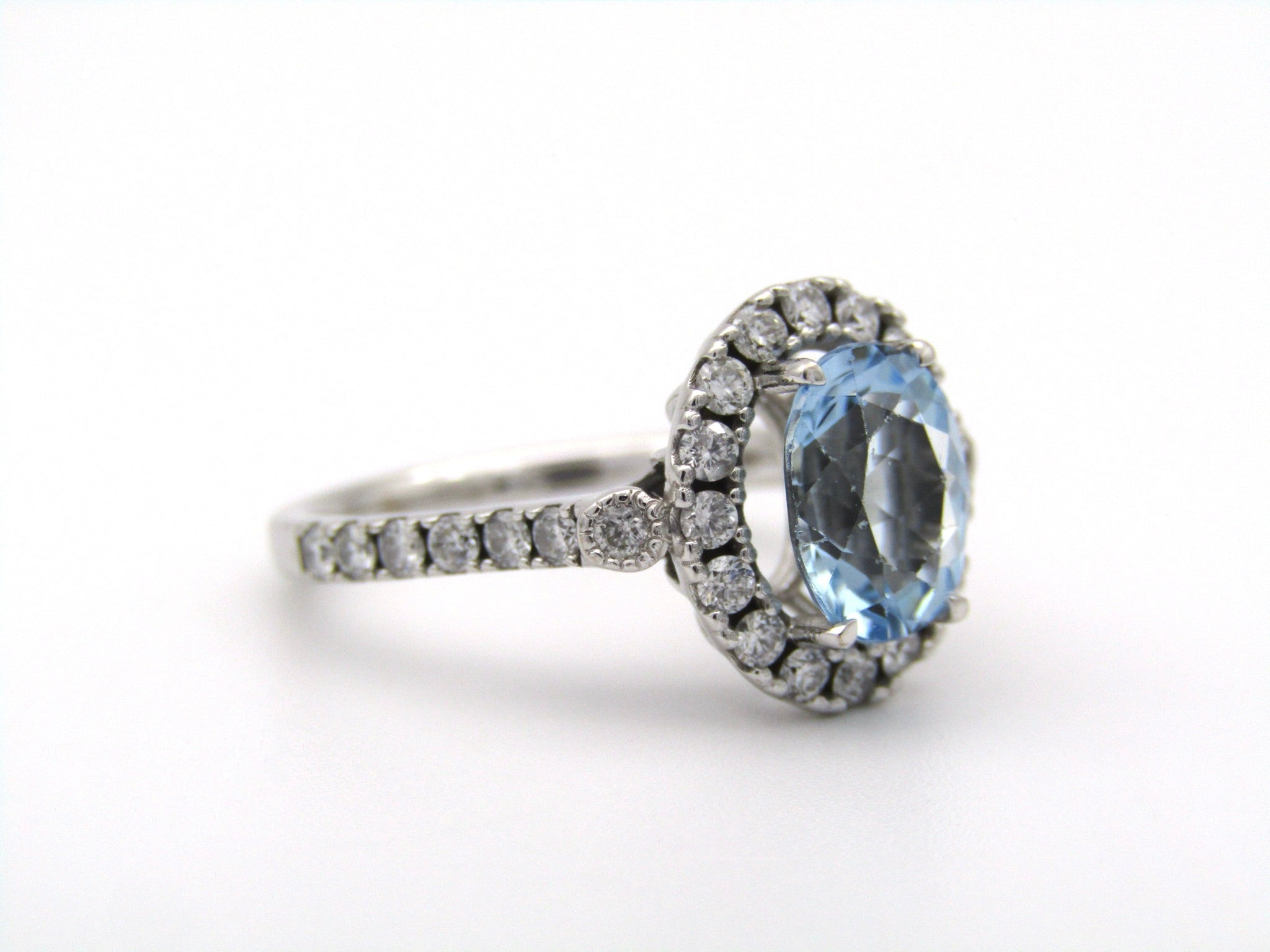 18K gold aquamarine and diamond ring by Browns.