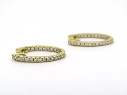 18K gold diamond hoop earrings by Browns.