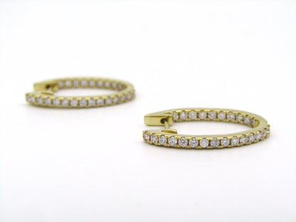 18K gold diamond hoop earrings by Browns.