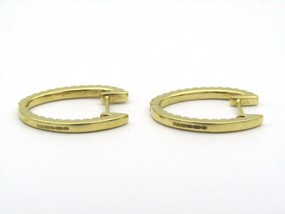 18K gold diamond hoop earrings by Browns.