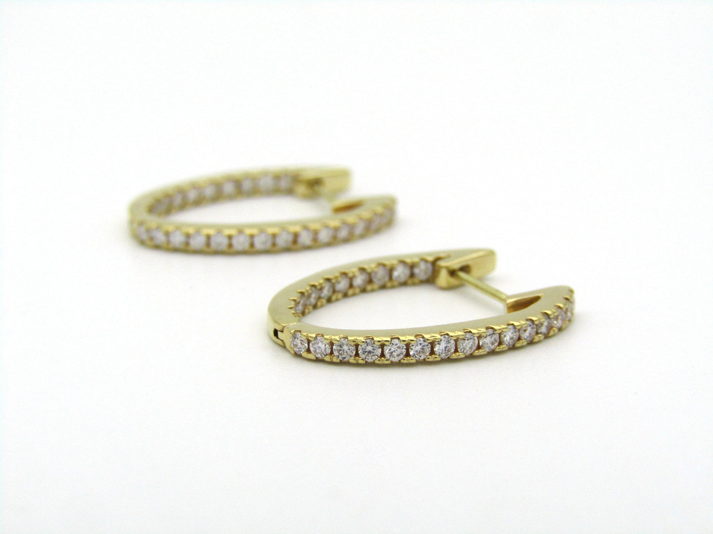 18K gold diamond hoop earrings by Browns.