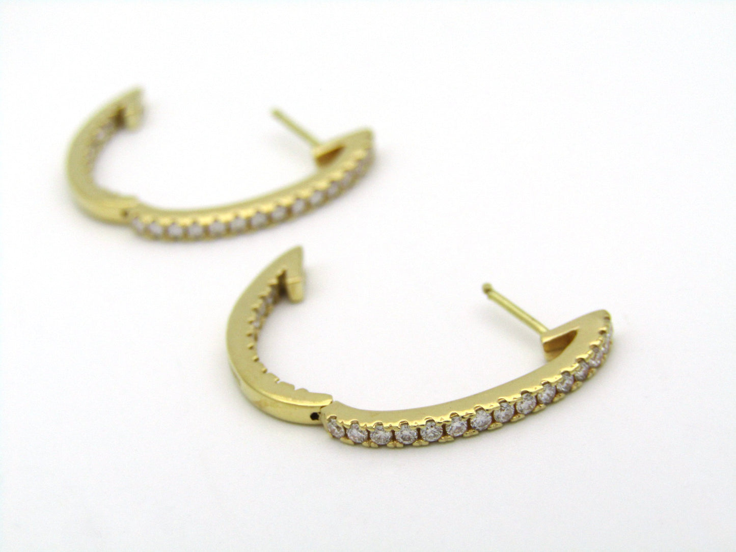 18K gold diamond hoop earrings by Browns.