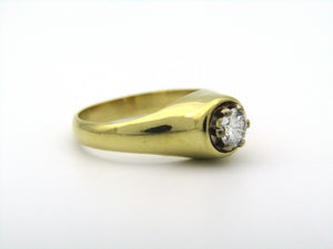 18K gold solitaire diamond ring.