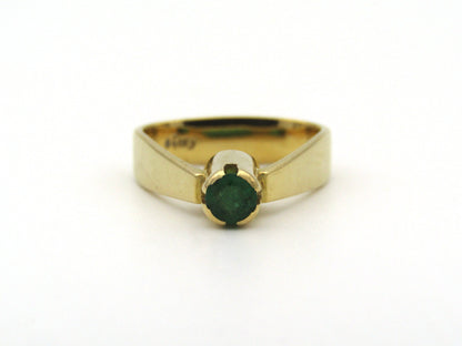 18K gold emerald ring by Erich Frey.