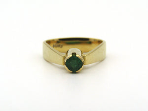 18K gold emerald ring by Erich Frey.