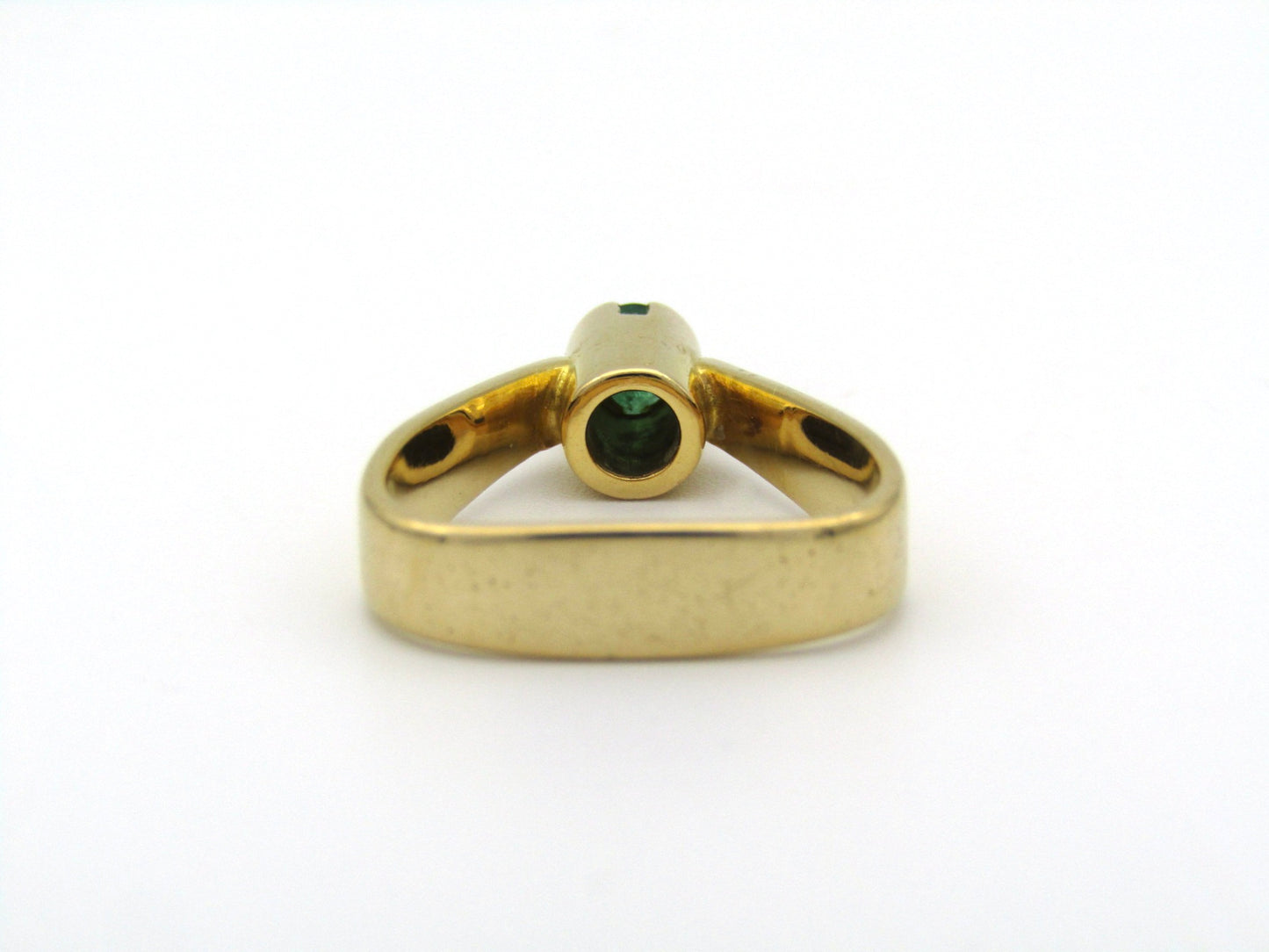 18K gold emerald ring by Erich Frey.