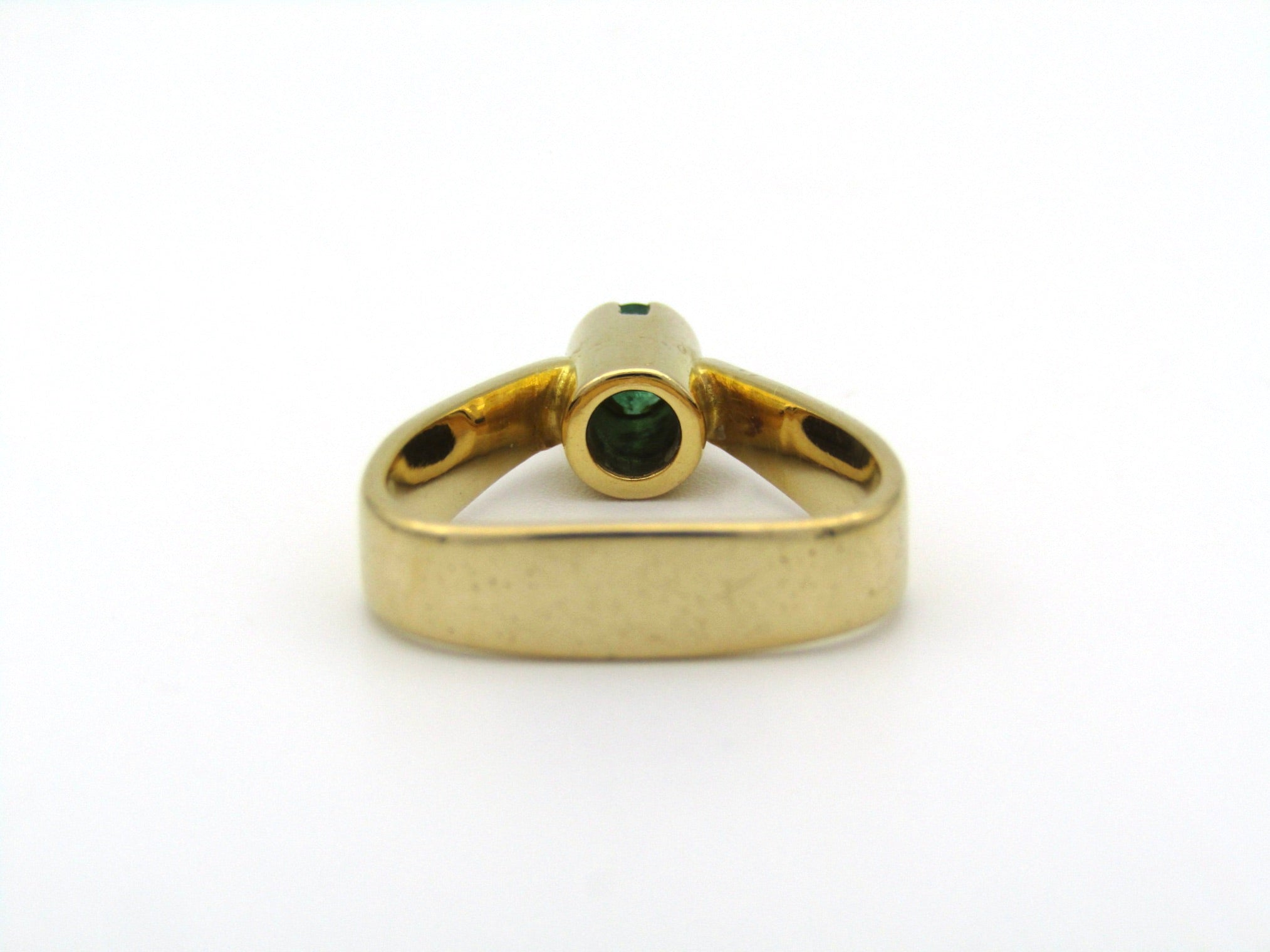 18K gold emerald ring by Erich Frey.