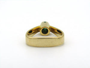 18K gold emerald ring by Erich Frey.