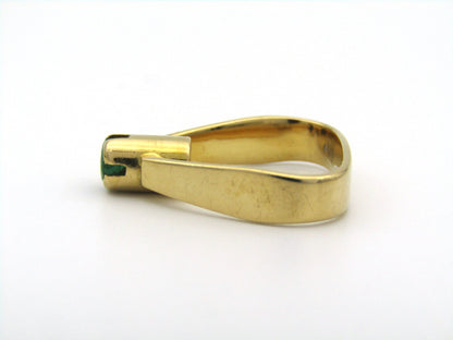 18K gold emerald ring by Erich Frey.