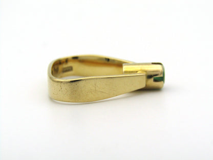 18K gold emerald ring by Erich Frey.