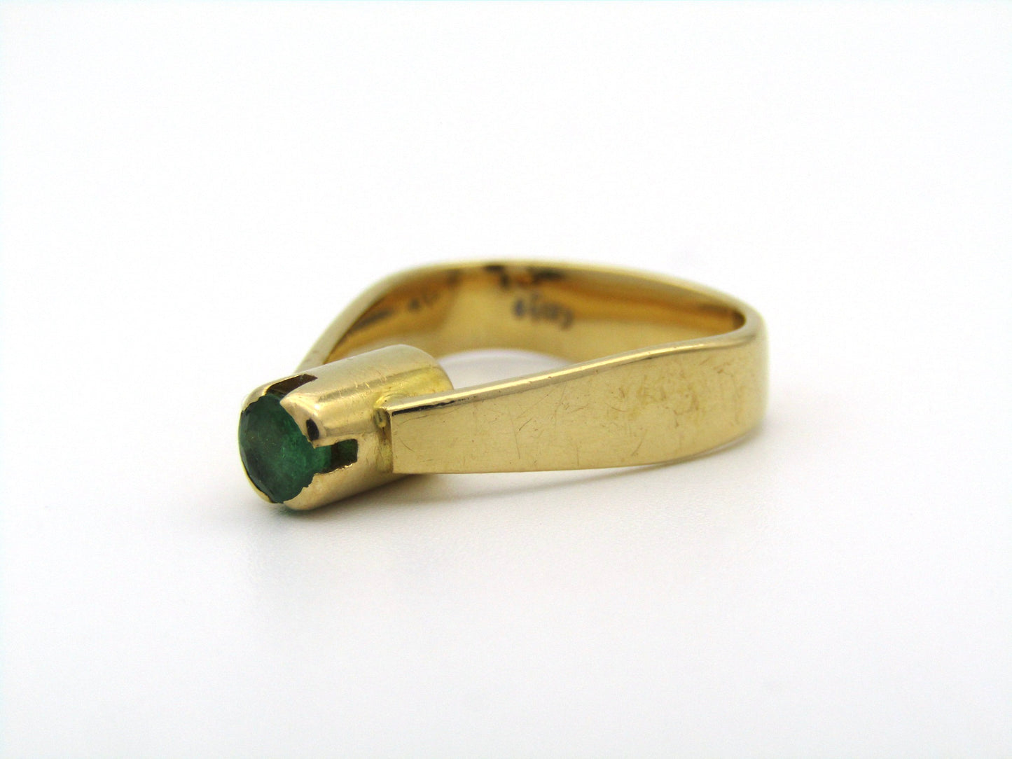 18K gold emerald ring by Erich Frey.