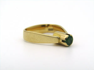 18K gold emerald ring by Erich Frey.