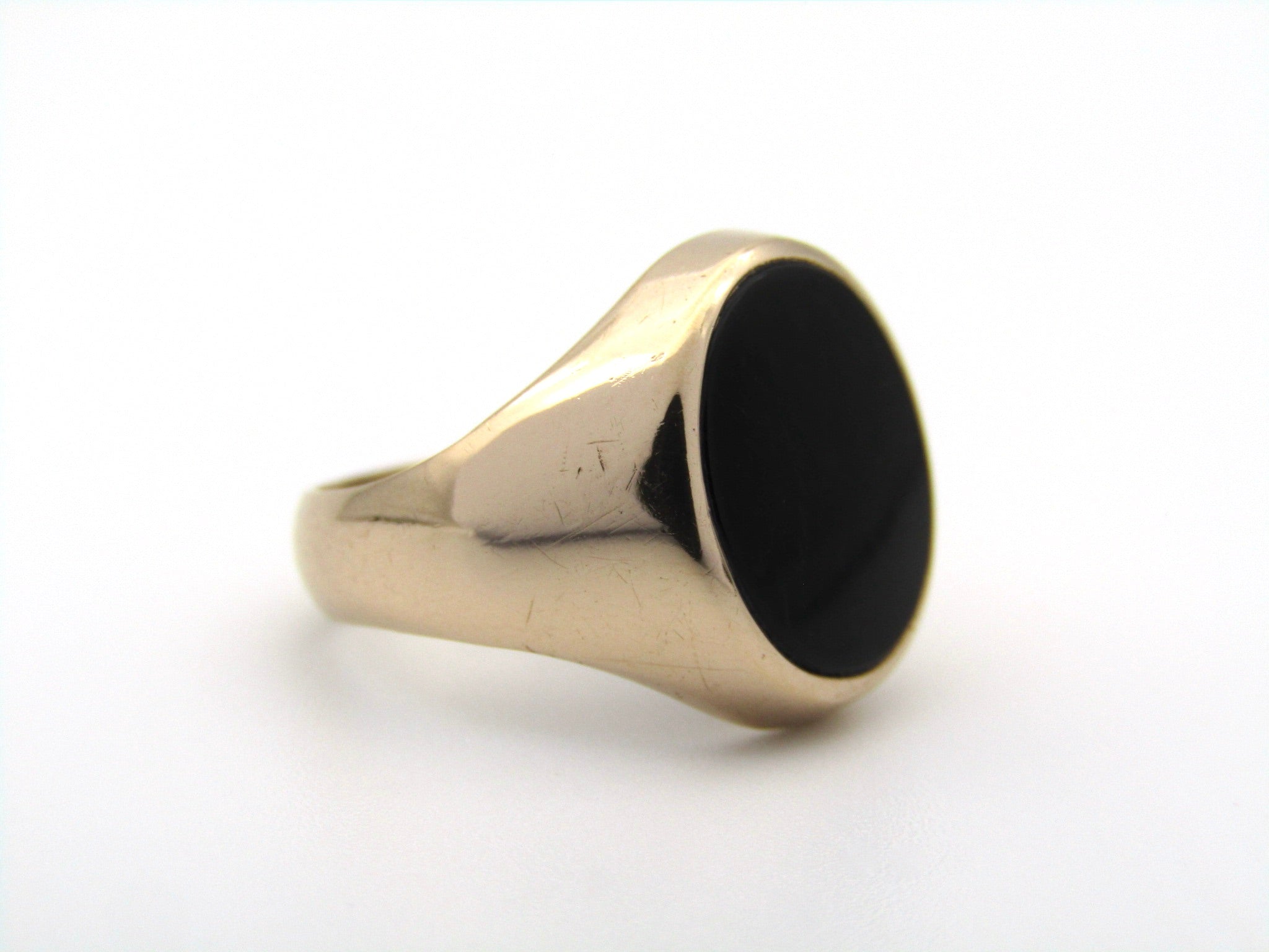 9K gold onyx signet ring.