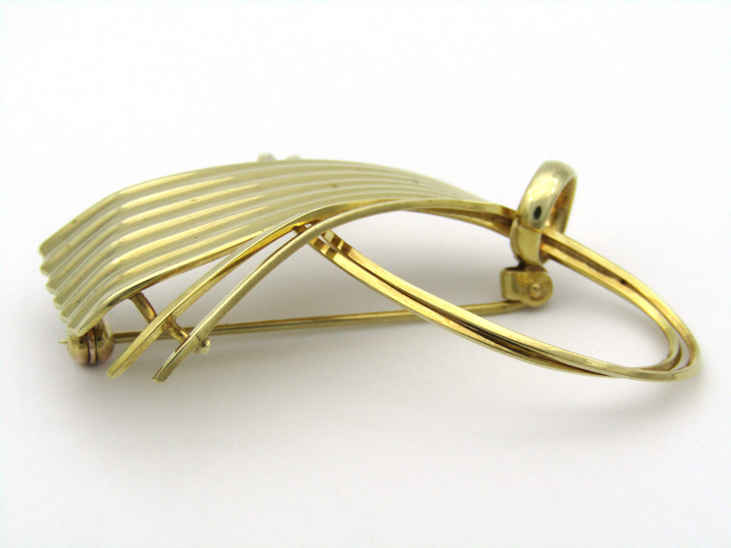 9K gold Retro half bow brooch.