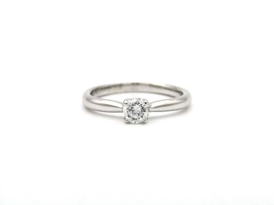 18K gold solitaire diamond ring by Browns.