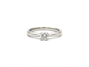 18K gold solitaire diamond ring by Browns.