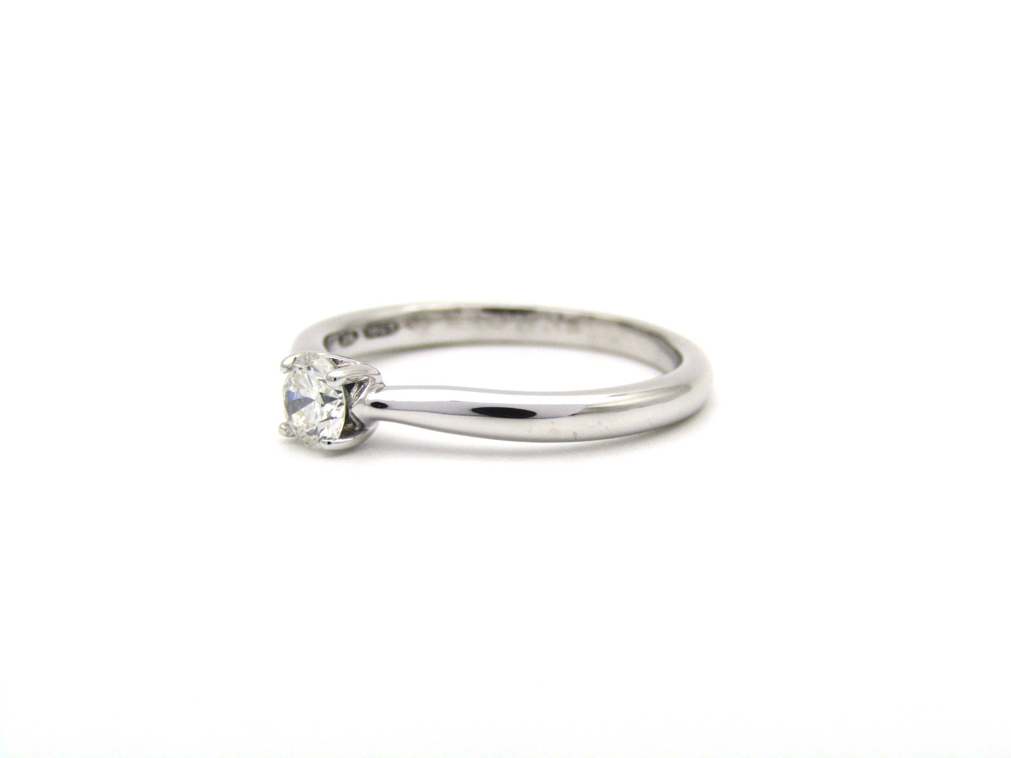 18K gold solitaire diamond ring by Browns.