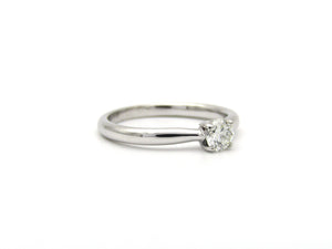 18K gold solitaire diamond ring by Browns.