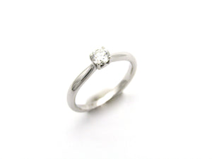 18K gold solitaire diamond ring by Browns.