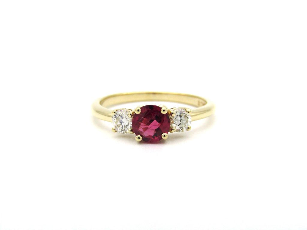 14K gold ruby and diamond trilogy ring.