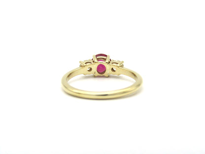 14K gold ruby and diamond trilogy ring.