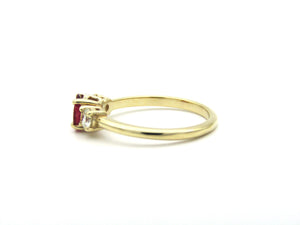 14K gold ruby and diamond trilogy ring.