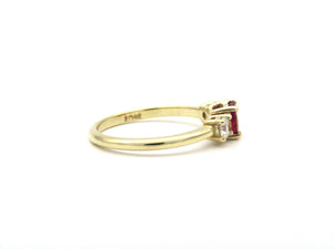 14K gold ruby and diamond trilogy ring.