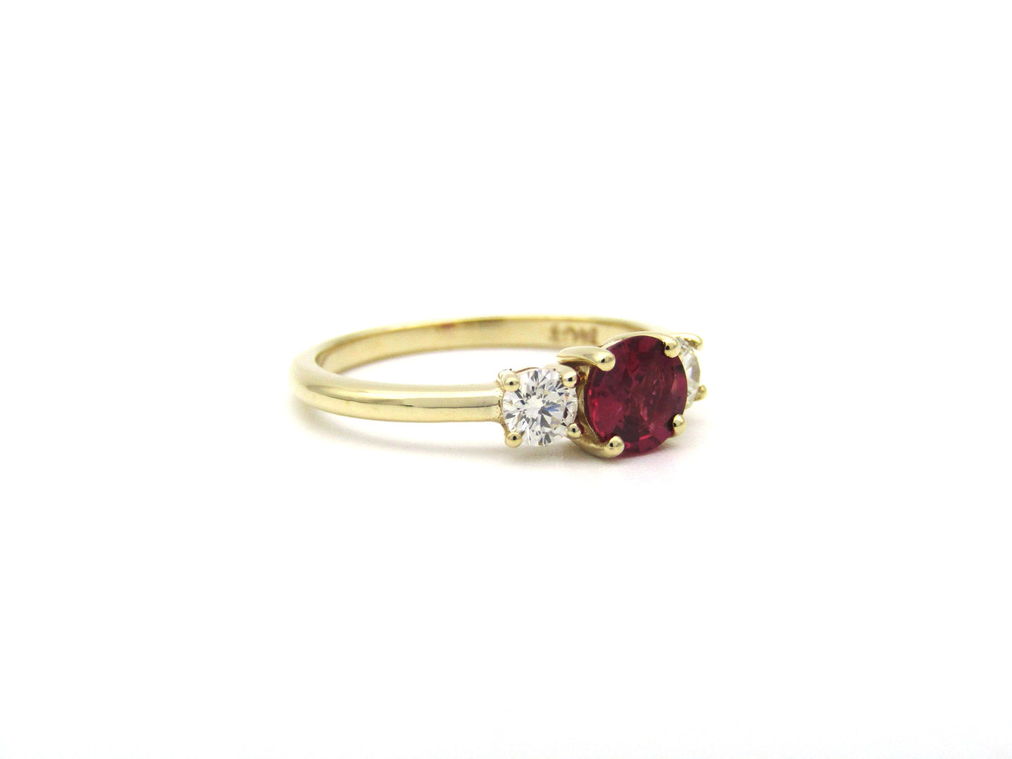 14K gold ruby and diamond trilogy ring.