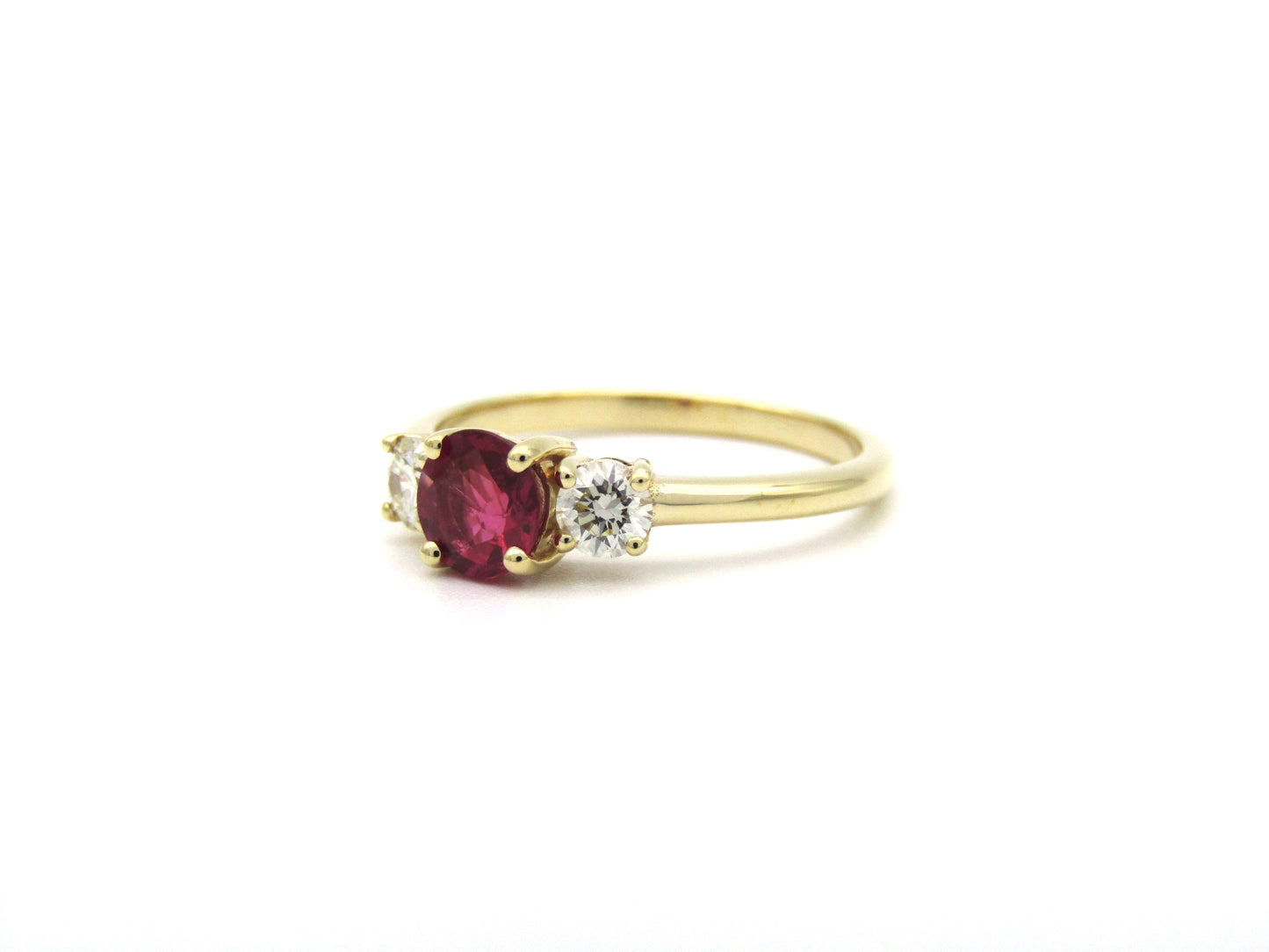 14K gold ruby and diamond trilogy ring.