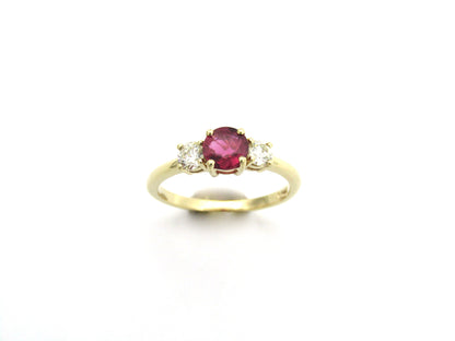 14K gold ruby and diamond trilogy ring.