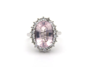 18K gold morganite and diamond halo ring.