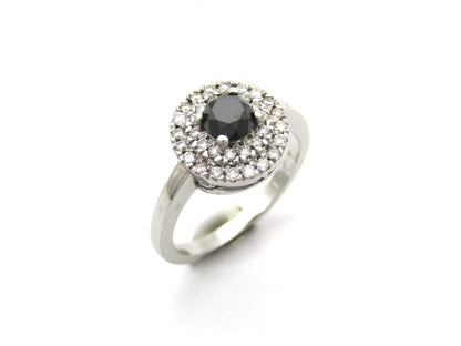 18K gold black and colourless diamond halo ring.