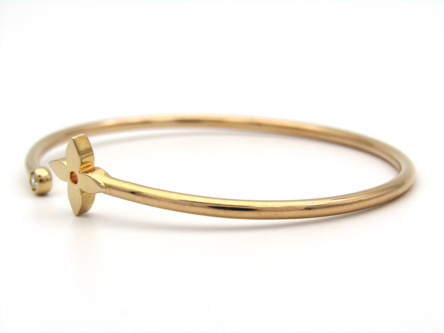 Louis Vuitton 18K rose gold Idylle Blossom twist bracelet.