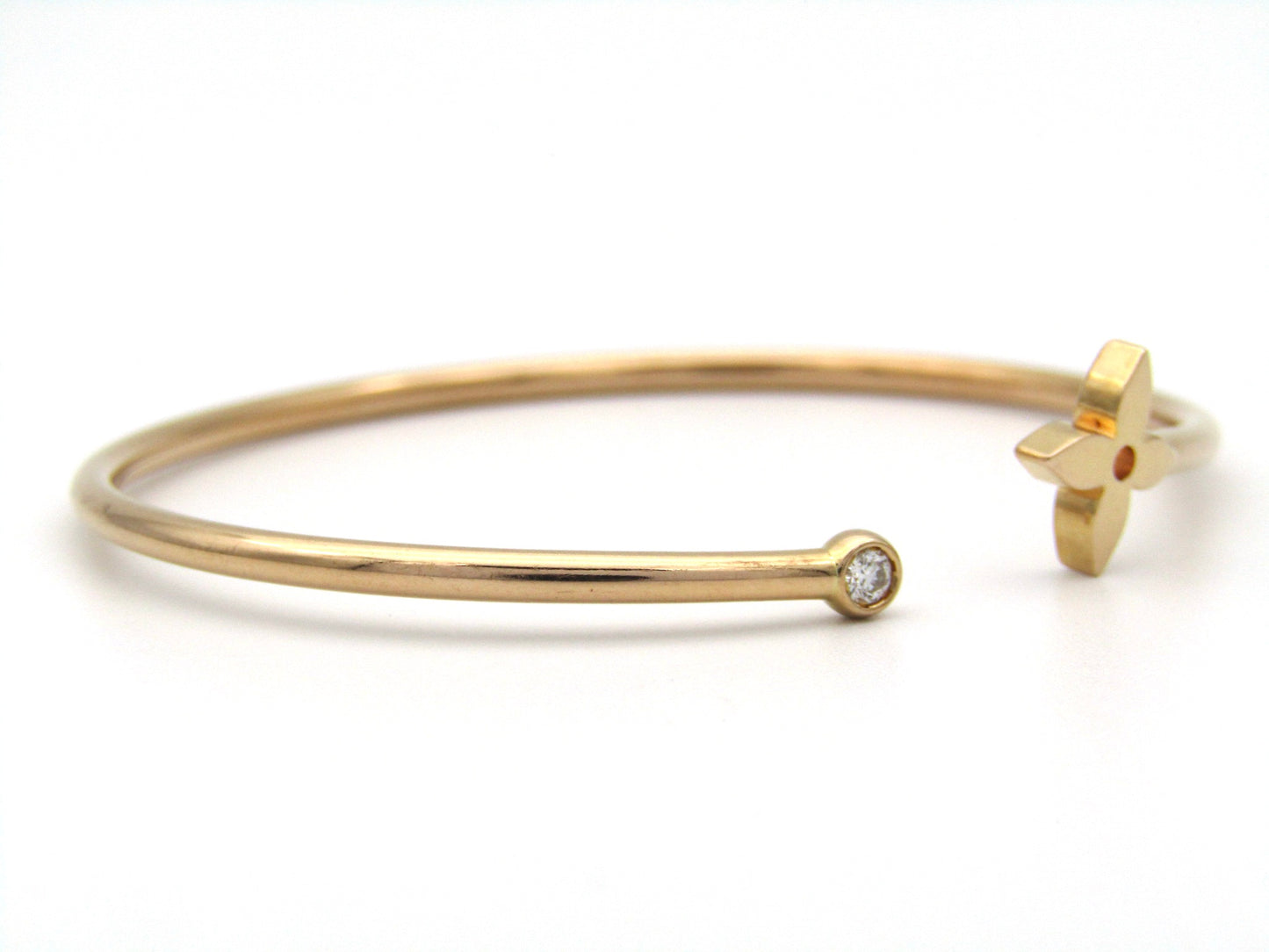 Louis Vuitton 18K rose gold Idylle Blossom twist bracelet.