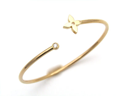 Louis Vuitton 18K rose gold Idylle Blossom twist bracelet.