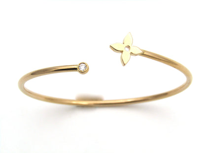 Louis Vuitton 18K rose gold Idylle Blossom twist bracelet.