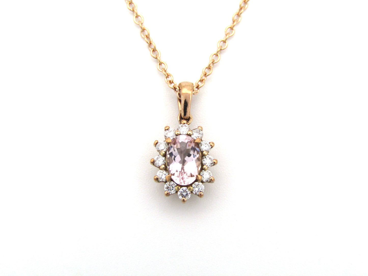 9K gold morganite and diamond pendant by Browns.