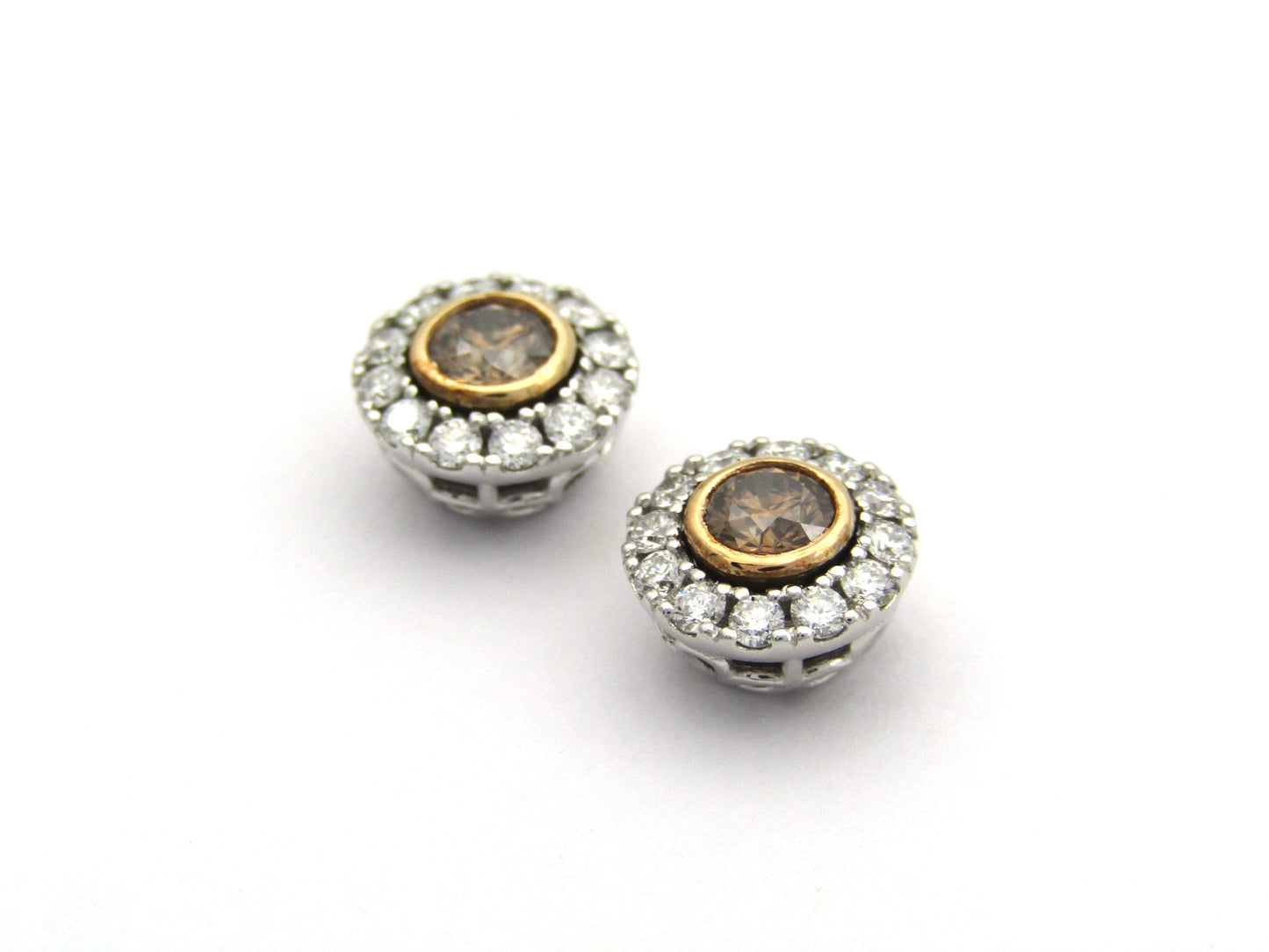 18K gold cognac diamond halo earrings by Browns.