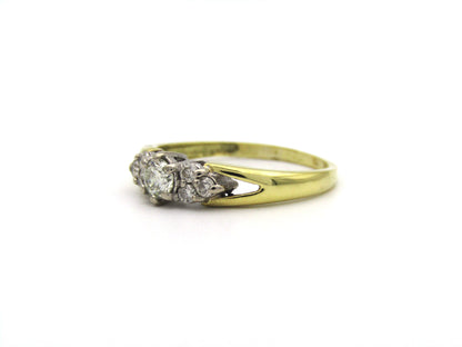 18K gold diamond ring.