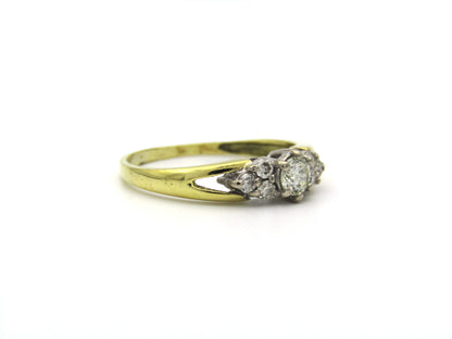 18K gold diamond ring.