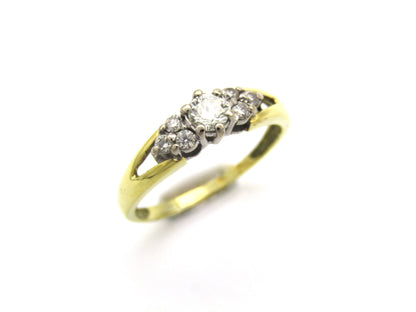 18K gold diamond ring.