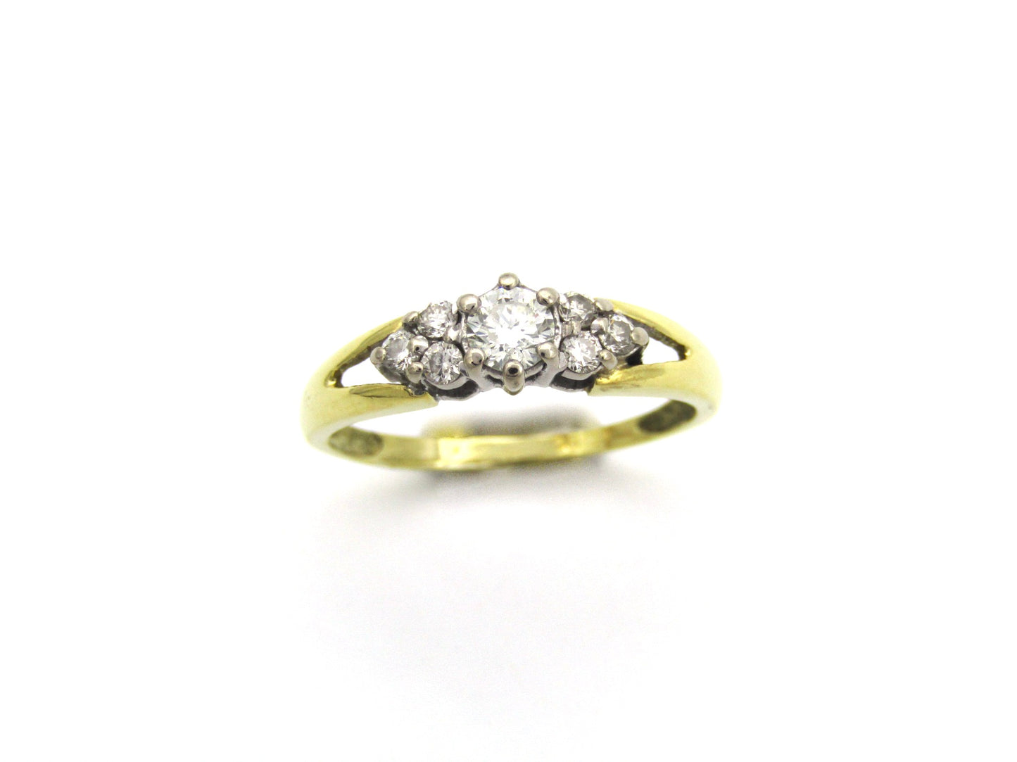 18K gold diamond ring.