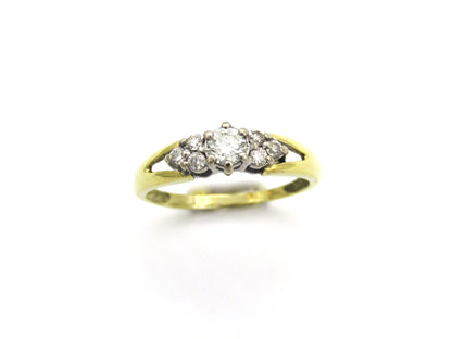 18K gold diamond ring.