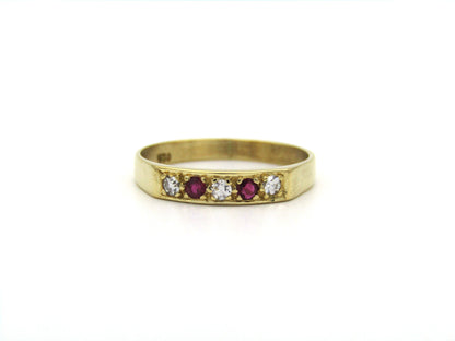 18K gold diamond and ruby ring.