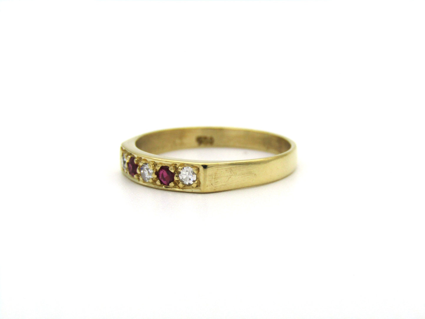 18K gold diamond and ruby ring.