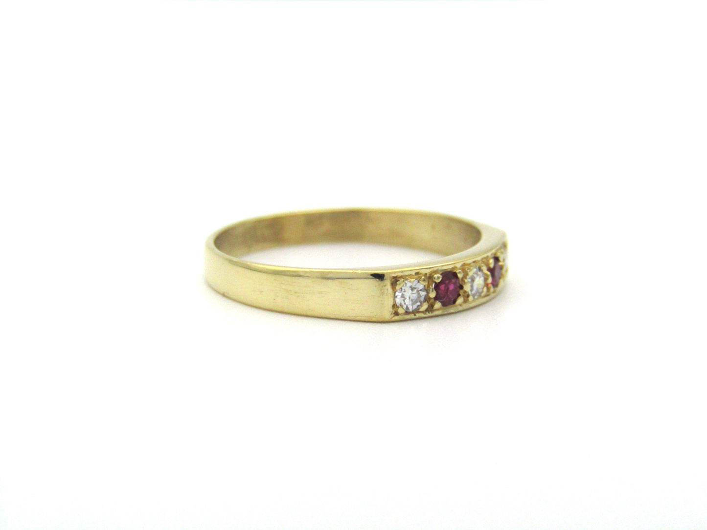 18K gold diamond and ruby ring.