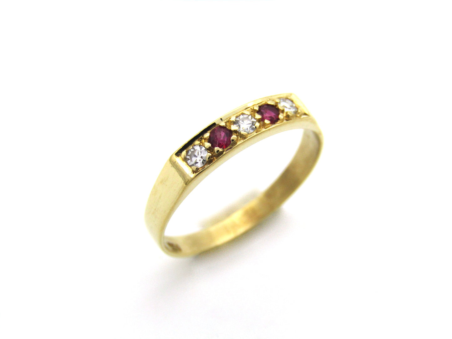 18K gold diamond and ruby ring.