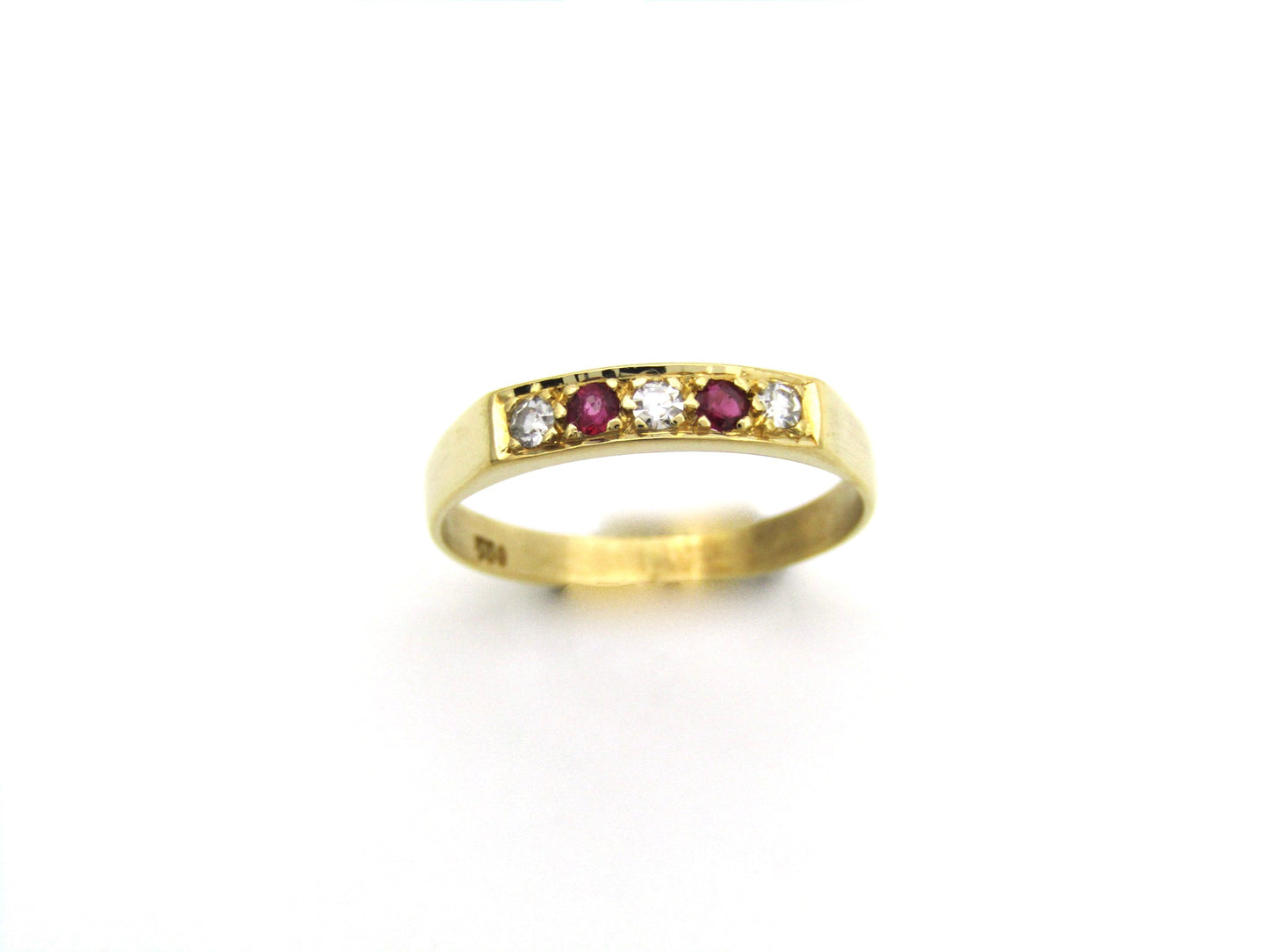 18K gold diamond and ruby ring.