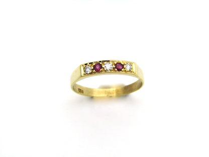 18K gold diamond and ruby ring.